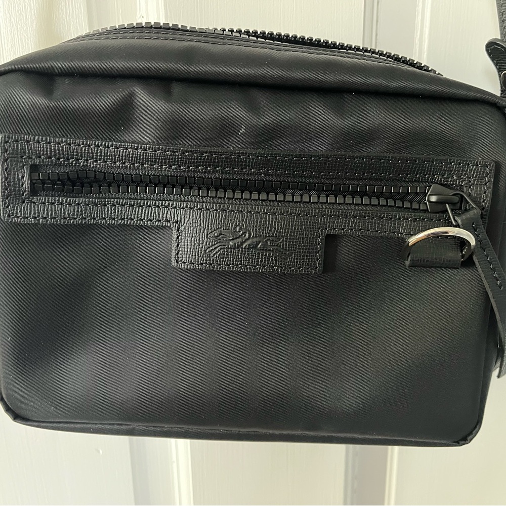 Black Longchamp camera bag